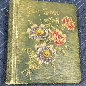 Turn of the century embossed postcard album. Only a few pages in front detached